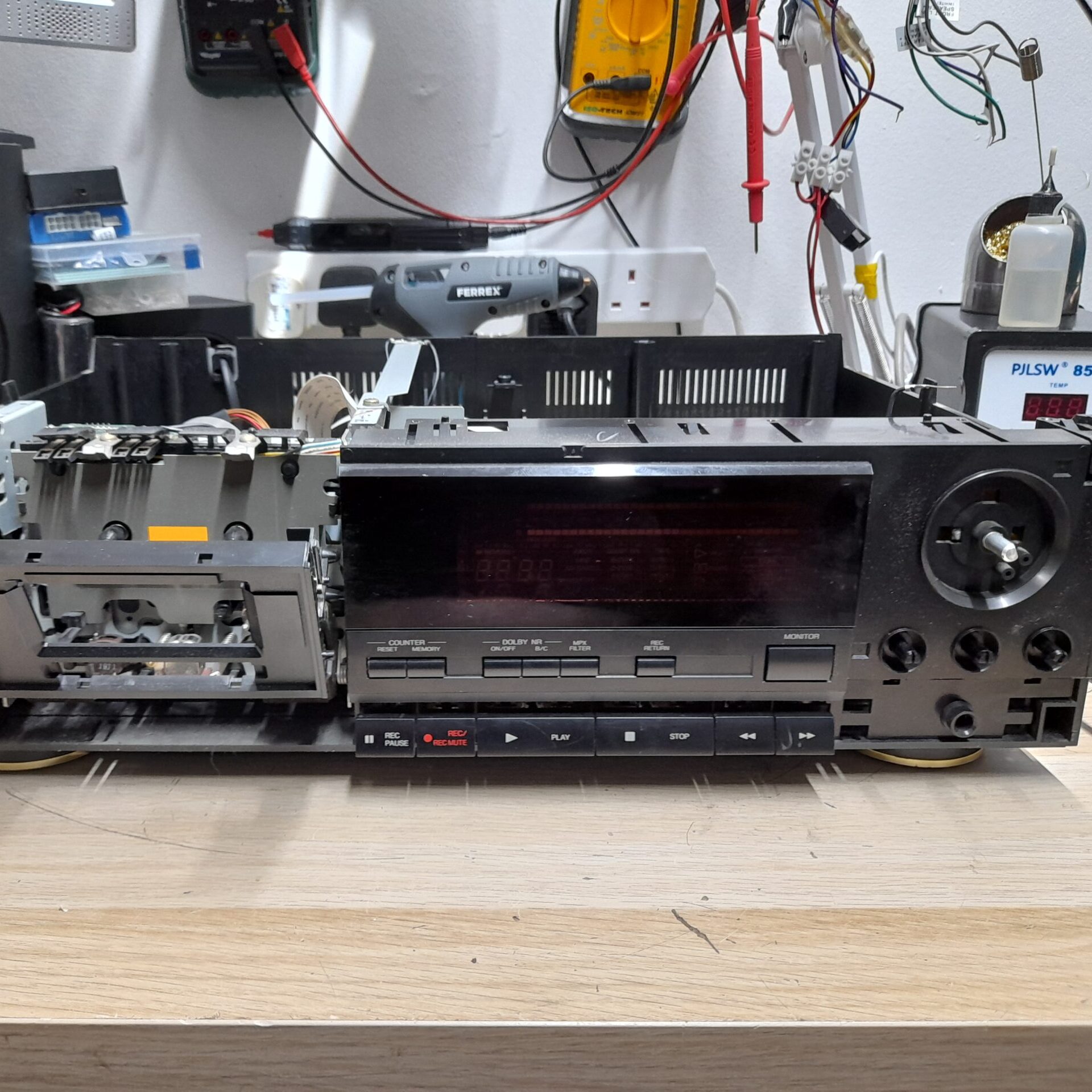 Denon DRM-700 Hi-Fi cassette deck repair showing internal tape mechanism and circuit boards